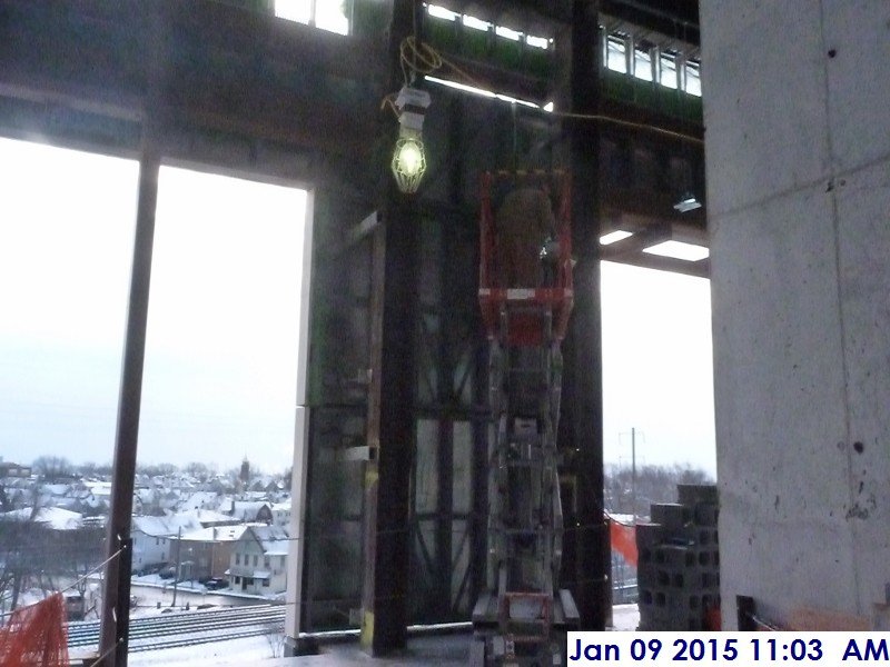Aligning the stone panels at the 4th floor South Elevation